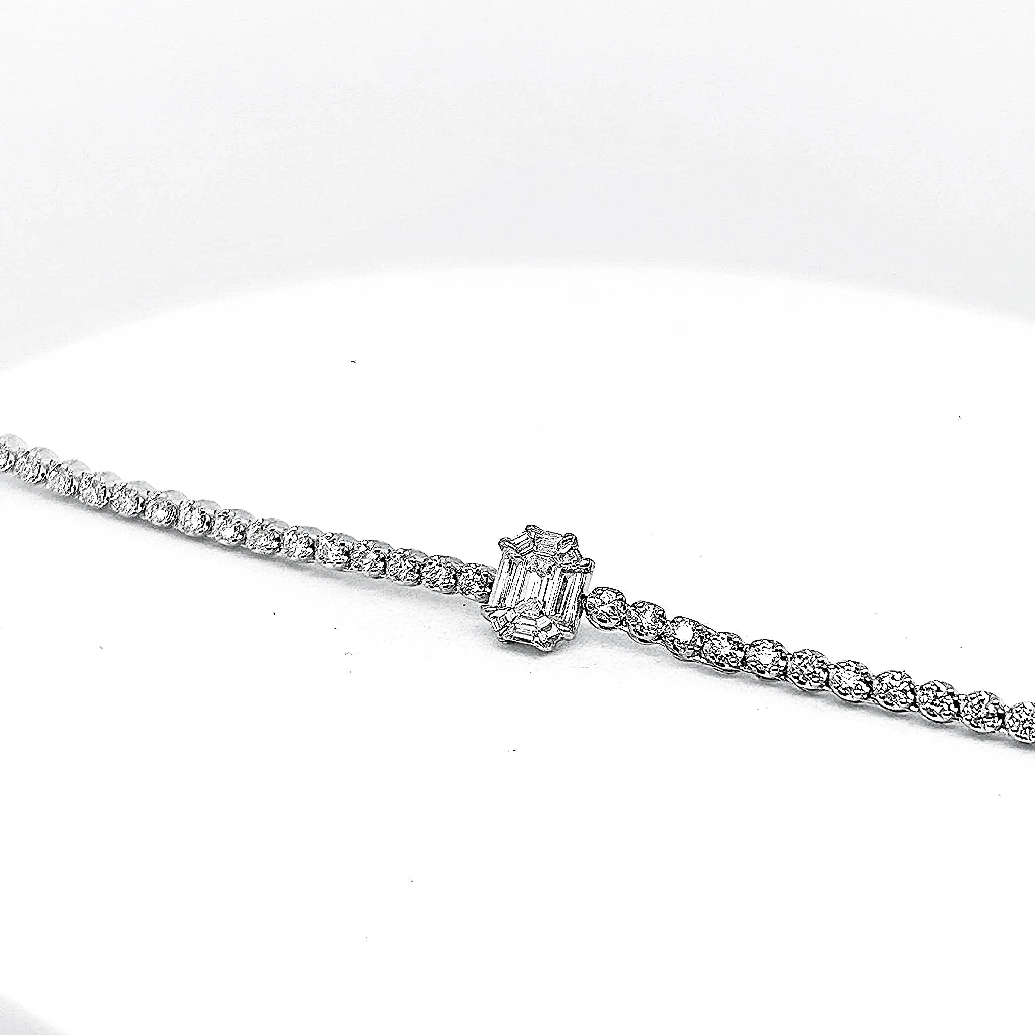 Emerald Invisible Setting Pie Cut Tennis Diamond Bracelet 18kt