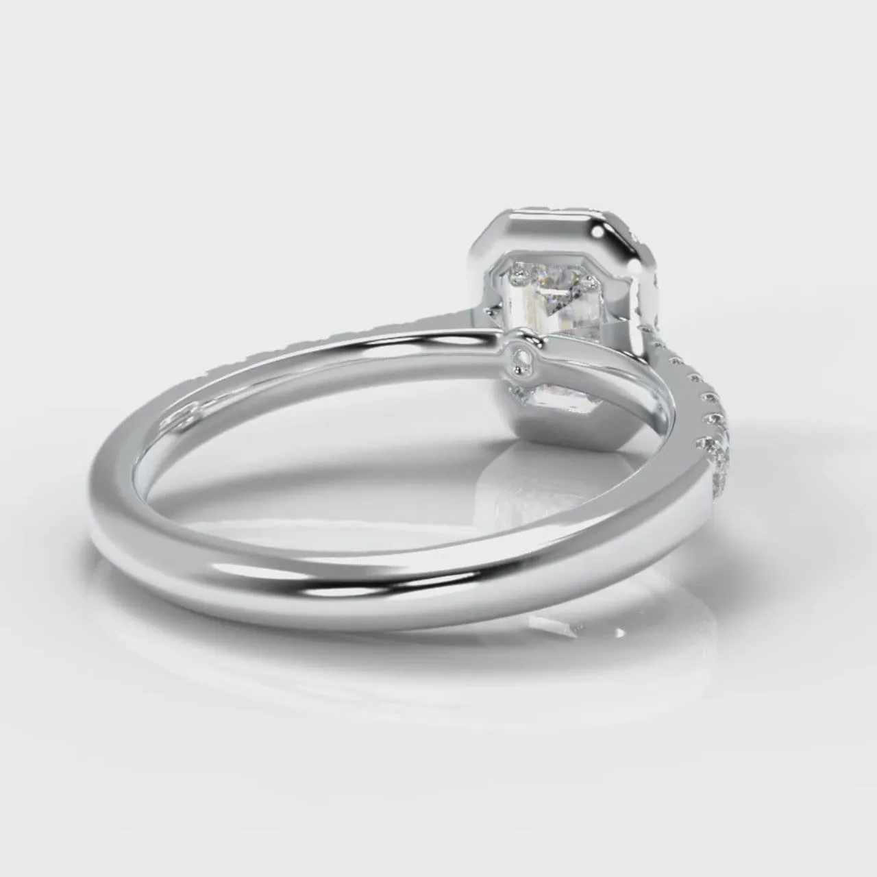 Micropavé Emerald Cut Diamond Halo Engagement Ring