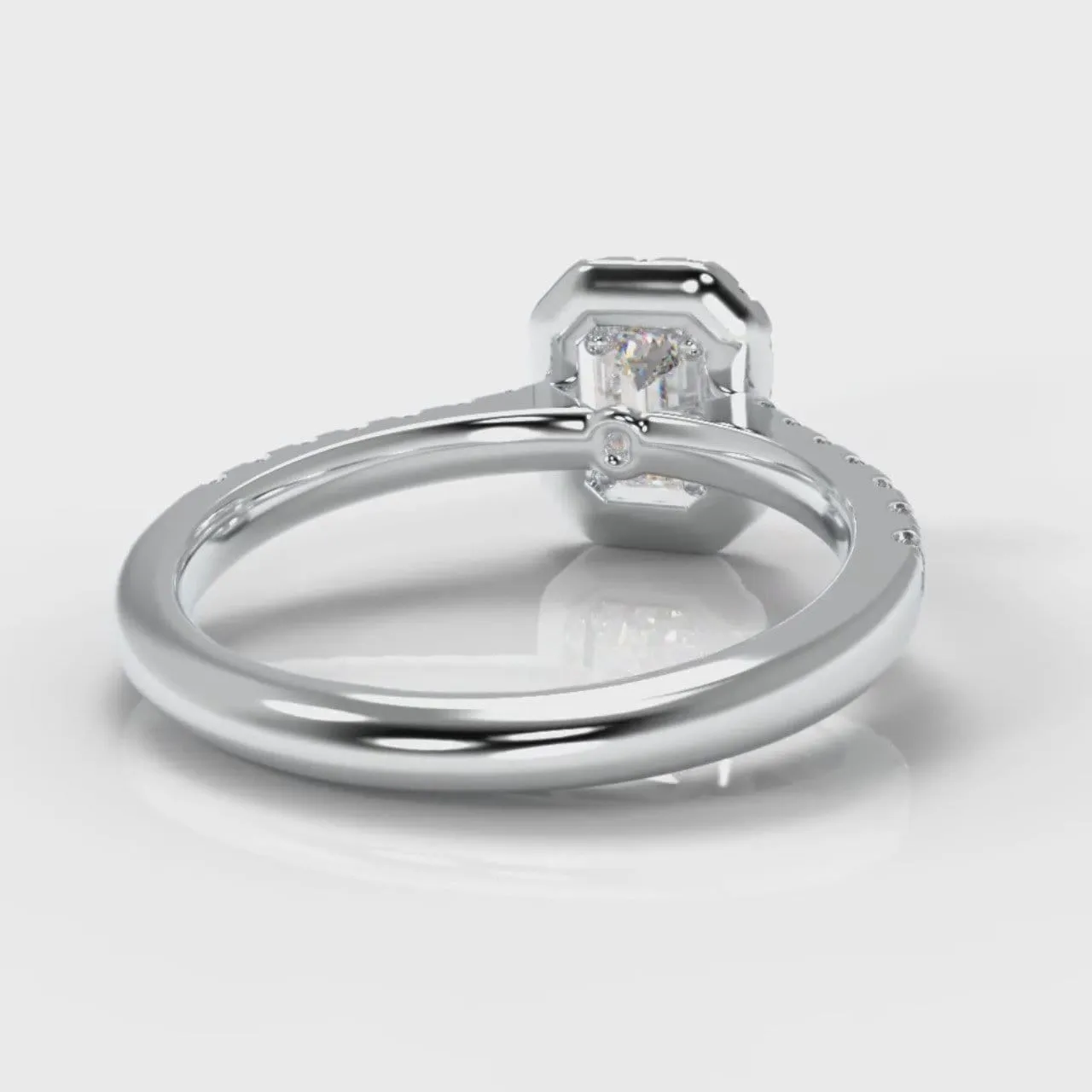 Micropavé Emerald Cut Diamond Halo Engagement Ring