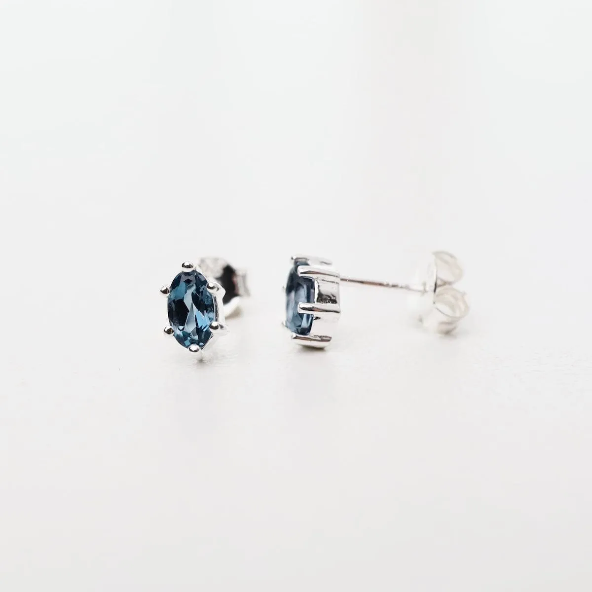 Oval Claw-set London Blue Topaz Stud Earrings